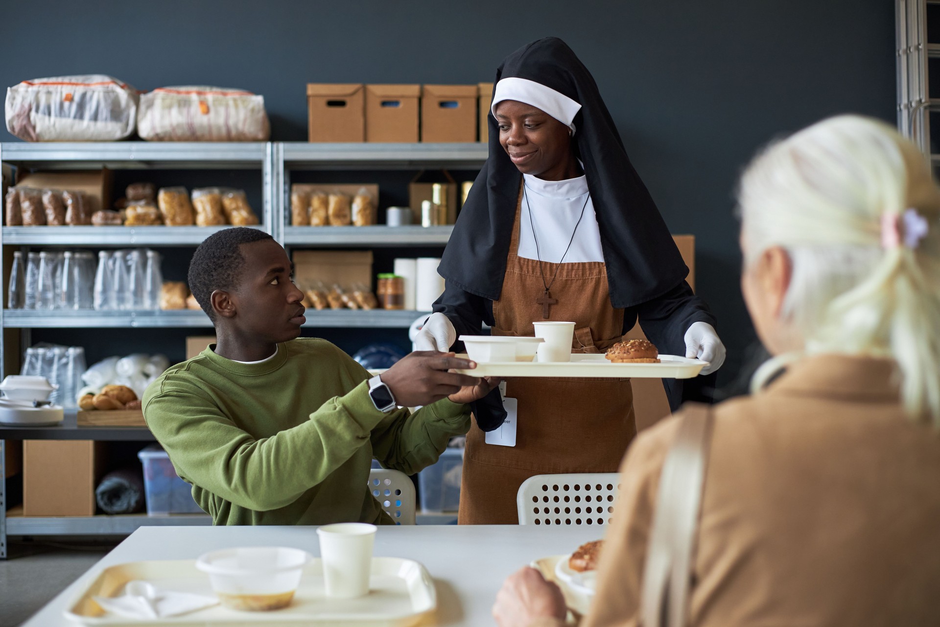Serving Breakfast in a Community Kitchen by Volunteers