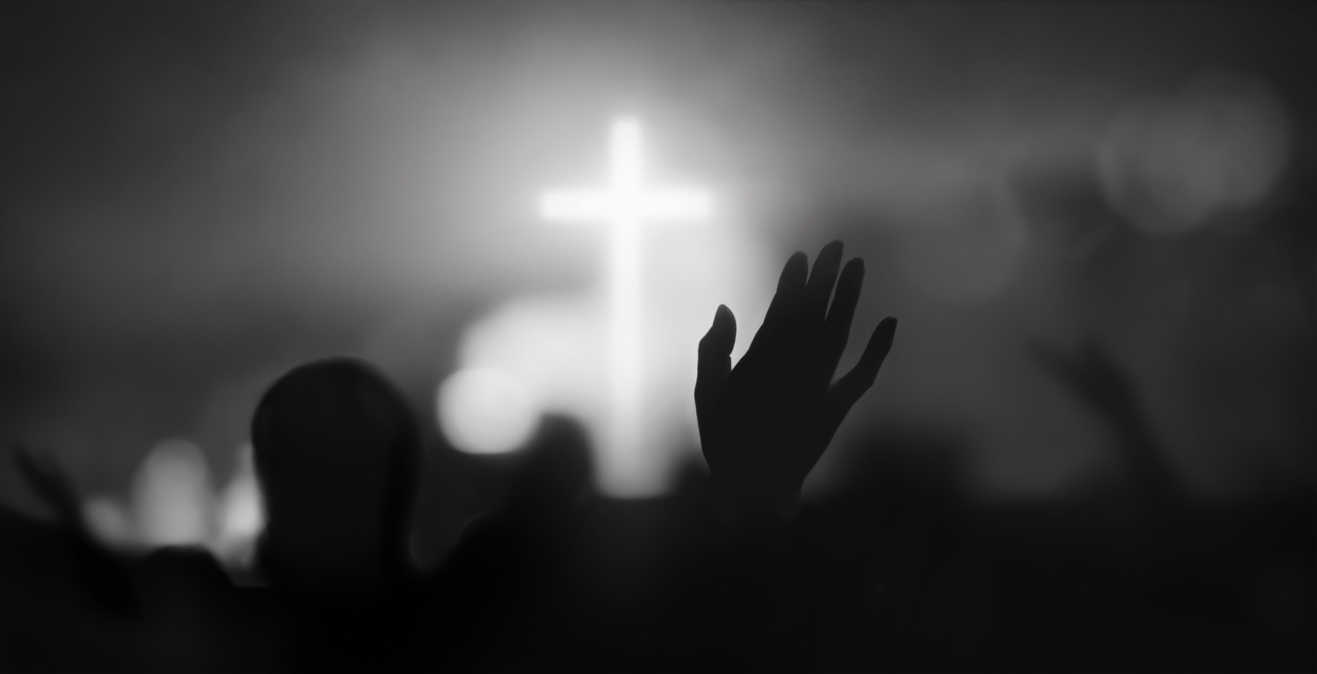 Passionate Christians raising their hands in praise, prayer and worship